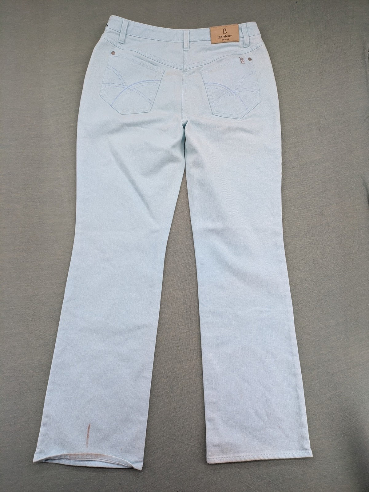 GARDEUR blue straight jeans with 5-pocket design, branded button, and leather patch.