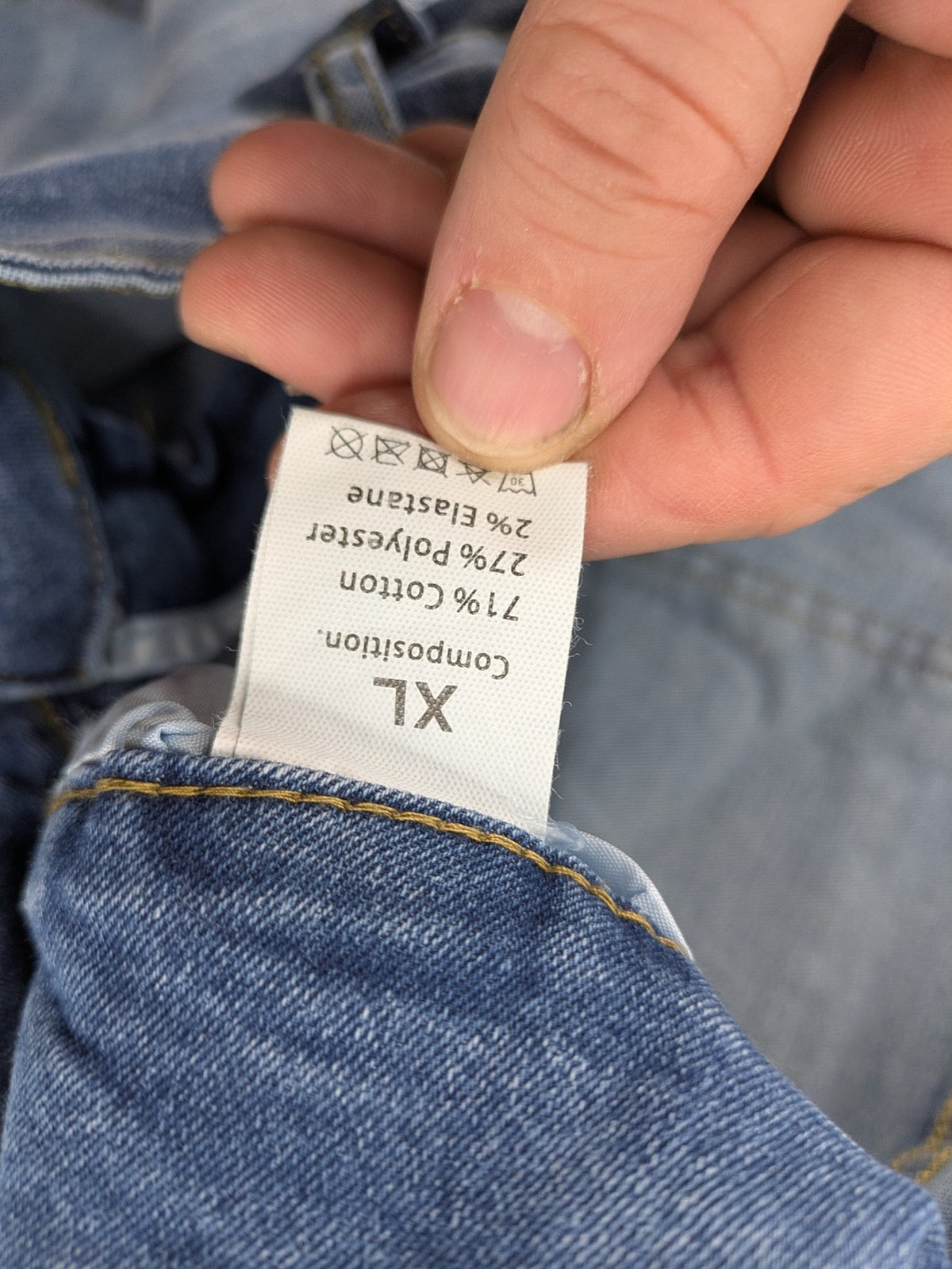 C&A blue bootcut jeans high waist stretch denim with double button closure.