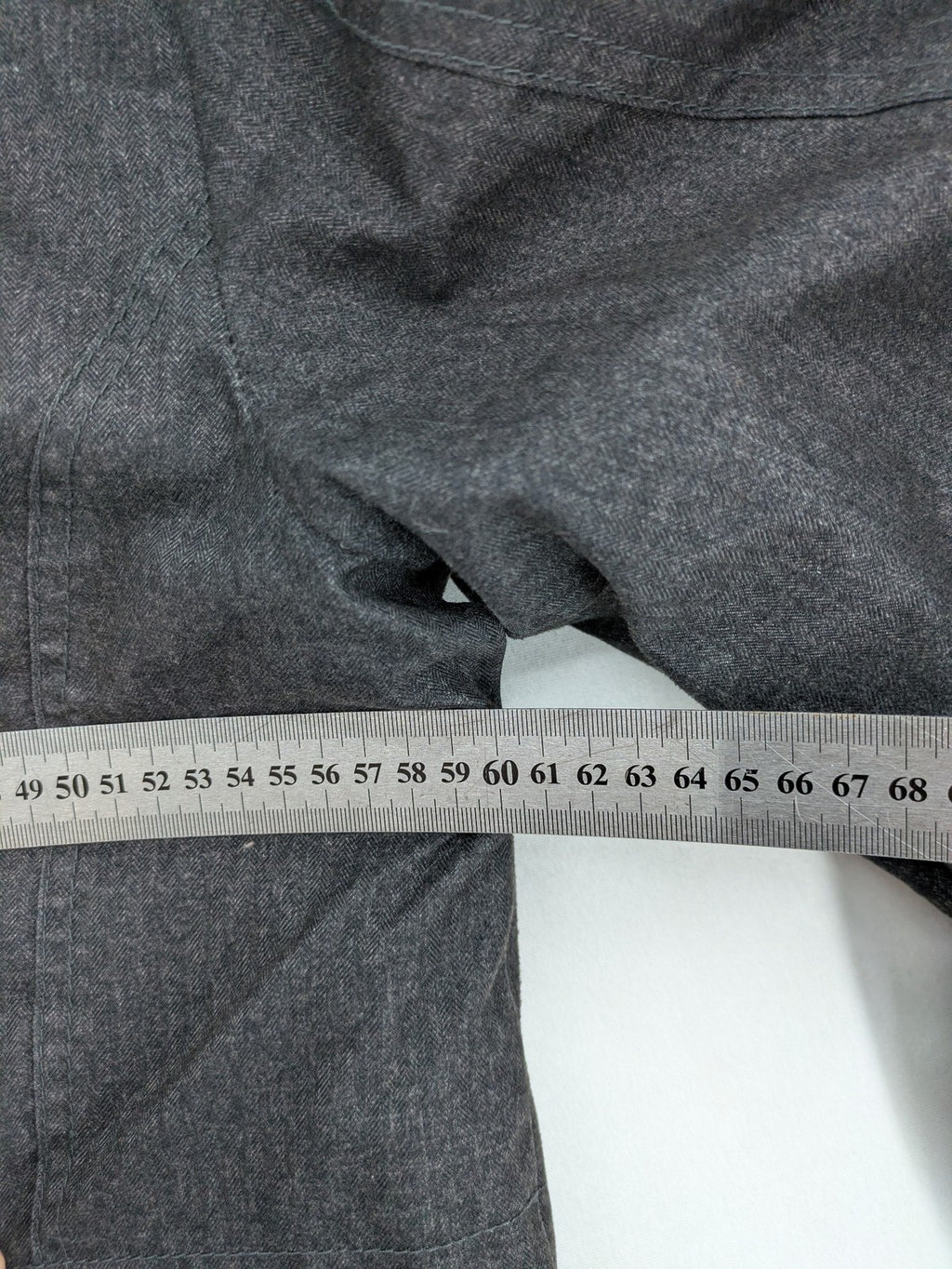 Rover & Lakes grey jacket with hood, quilted lining, and multiple pockets.