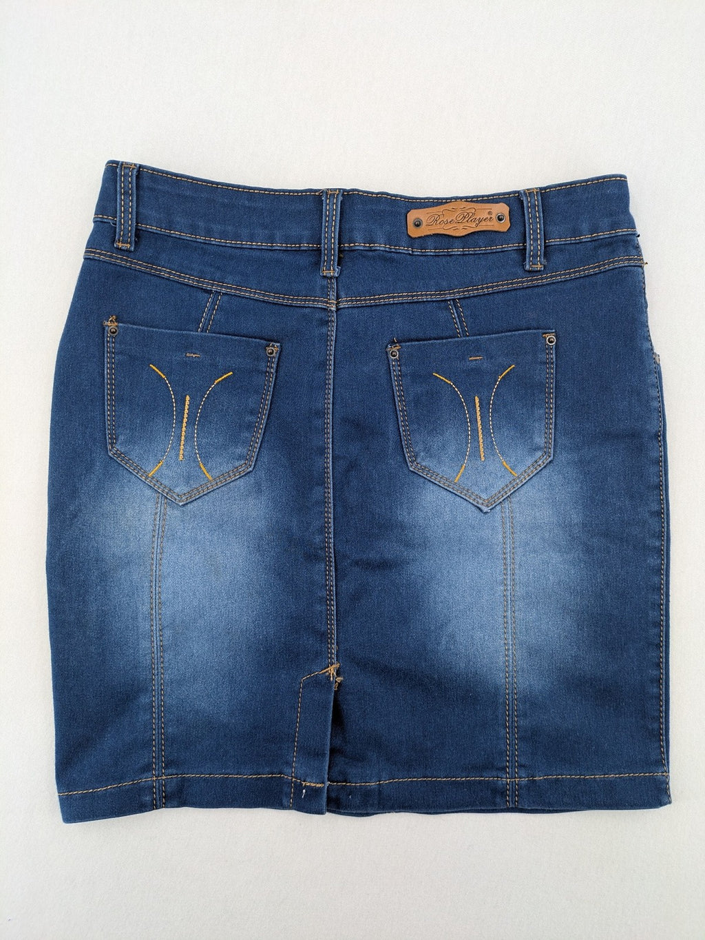 Rose Player pink denim pencil skirt, five-pocket design, comfortable stretch material.