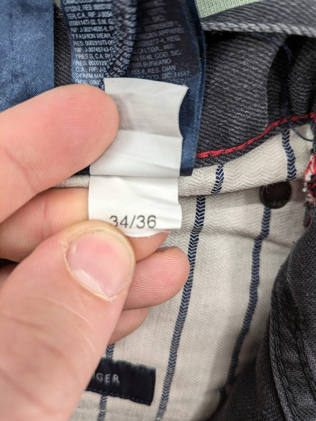 Tommy Hilfiger grey straight jeans faded denim with iconic logo detail.