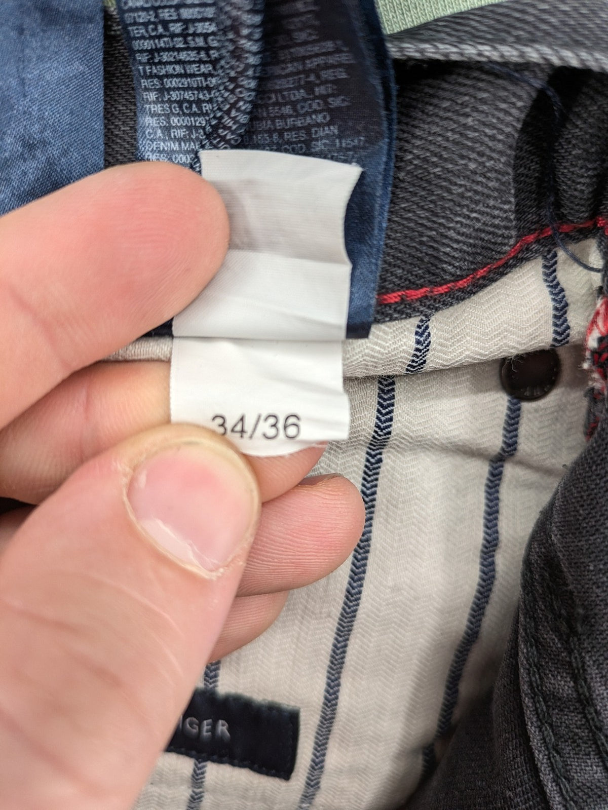 Tommy Hilfiger grey straight jeans faded denim with iconic logo detail.