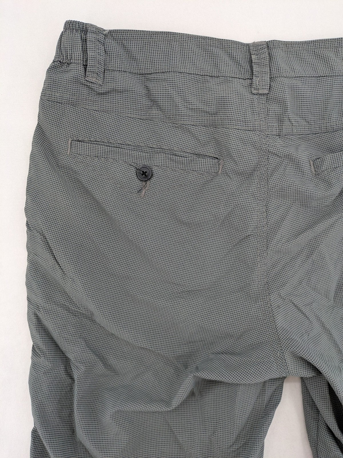 Luciano grey shorts lightweight polyamide with elastic waistband and button closure.