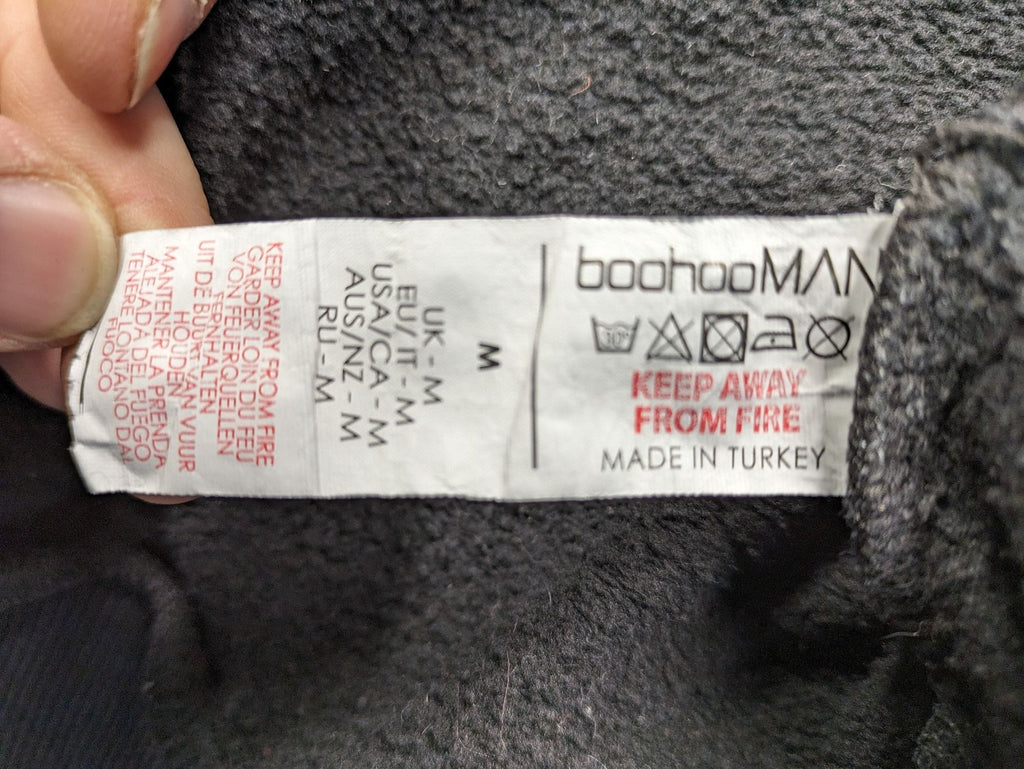 Boohooman zip-through hoodie black with floral graphic and "Limited Edition Collection" text.