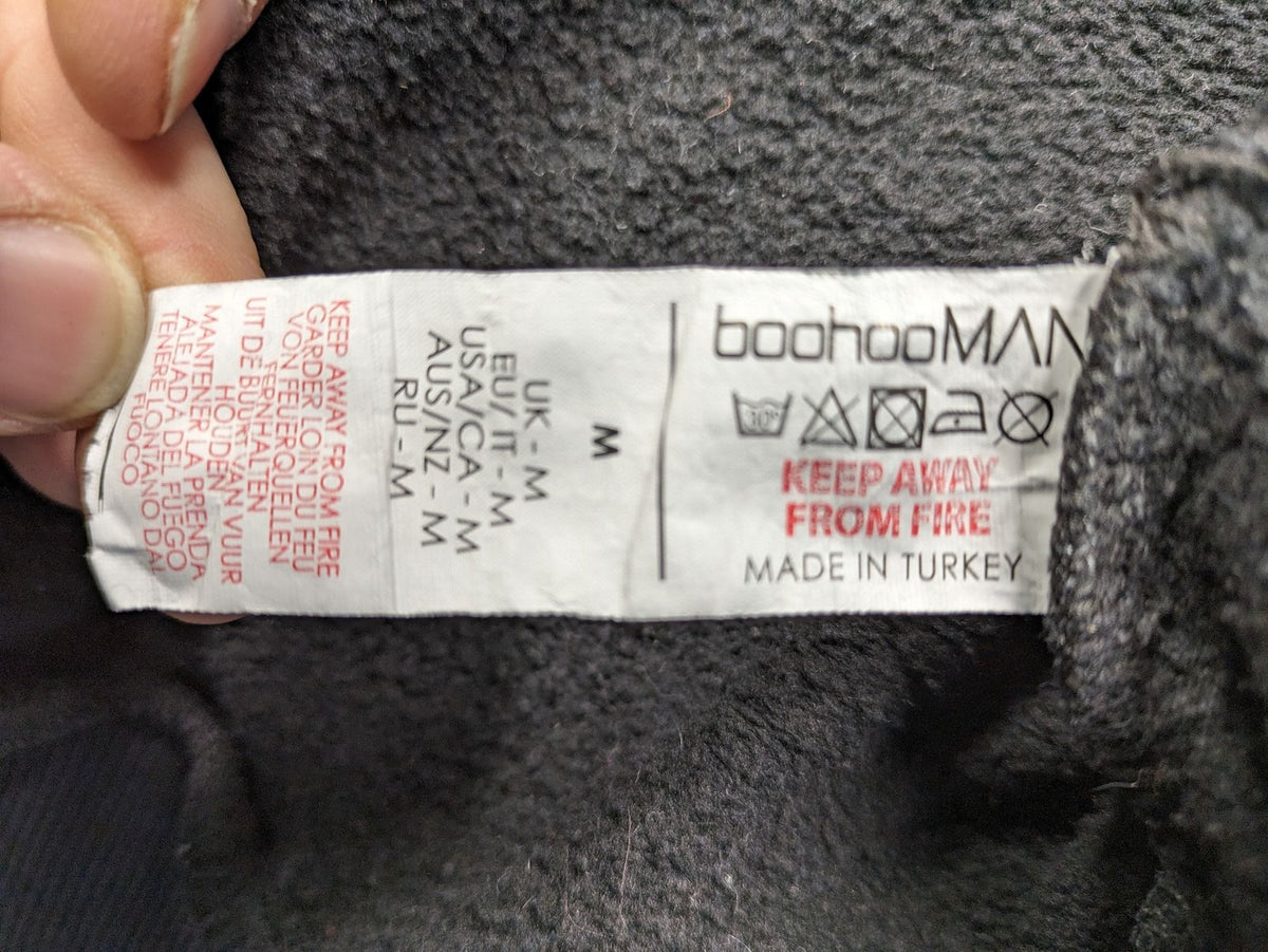 Boohooman zip-through hoodie black with floral graphic and "Limited Edition Collection" text.