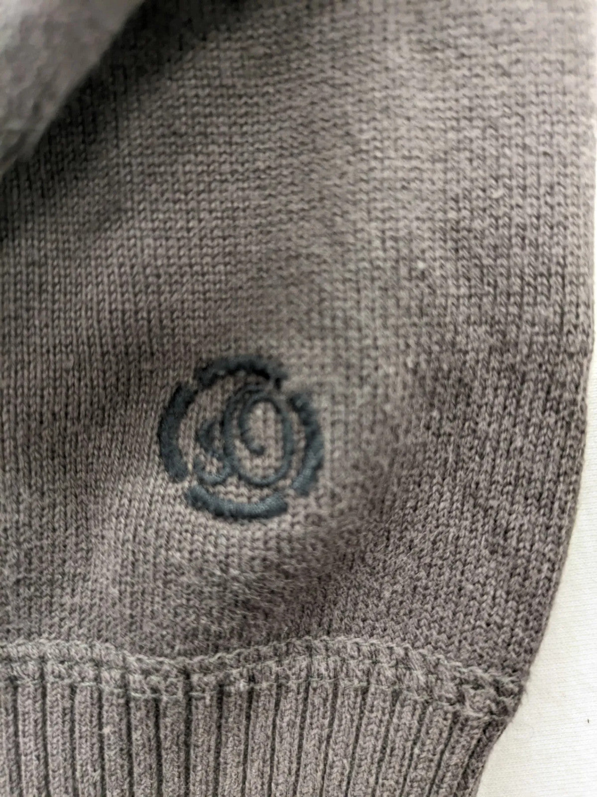 s.Oliver brown turtle neck jumper with "Radford Inc." graphic print and ribbed cuffs.