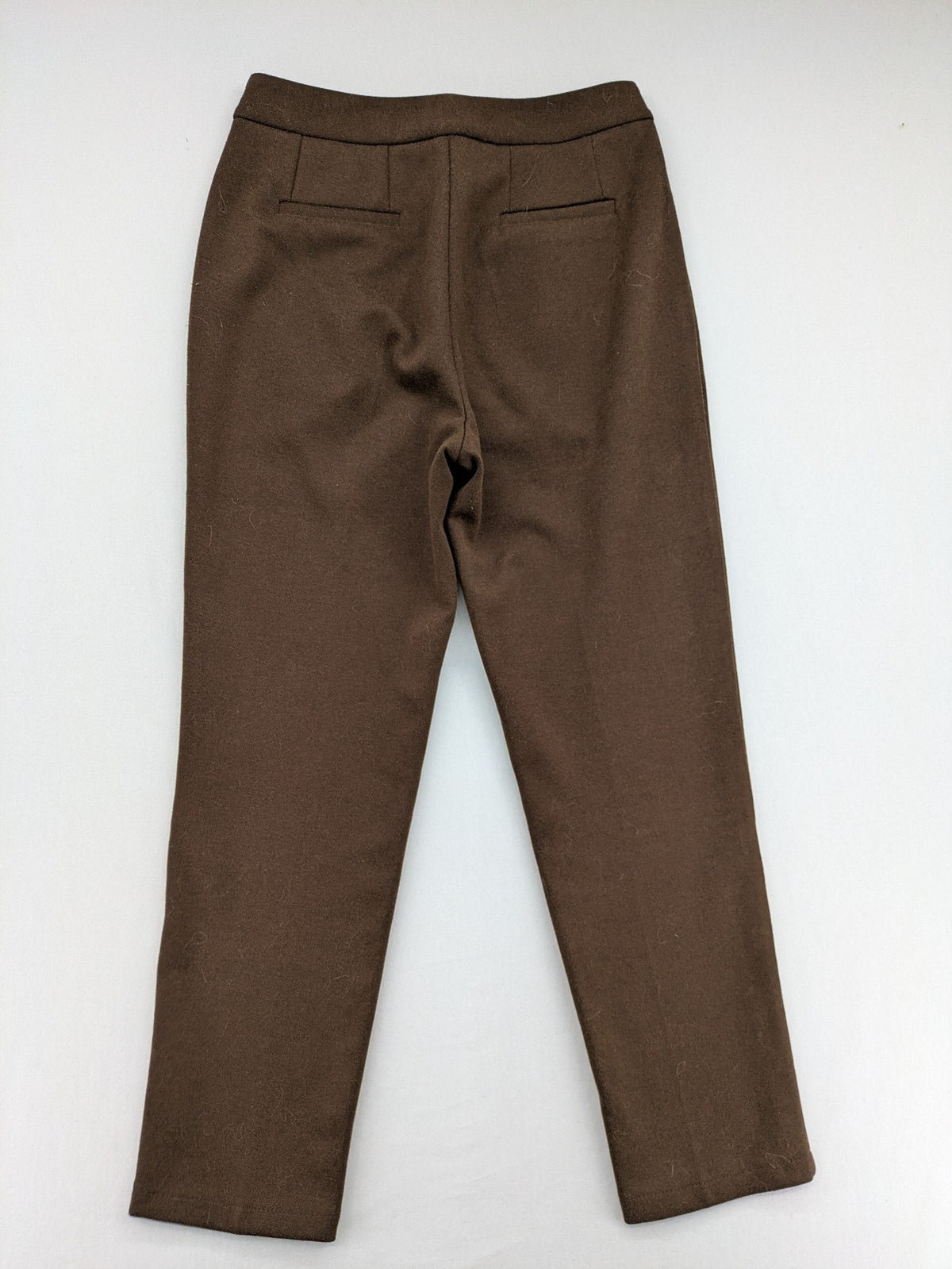 Liuliu pink high waist pants with pleats, side pockets, and classic design.