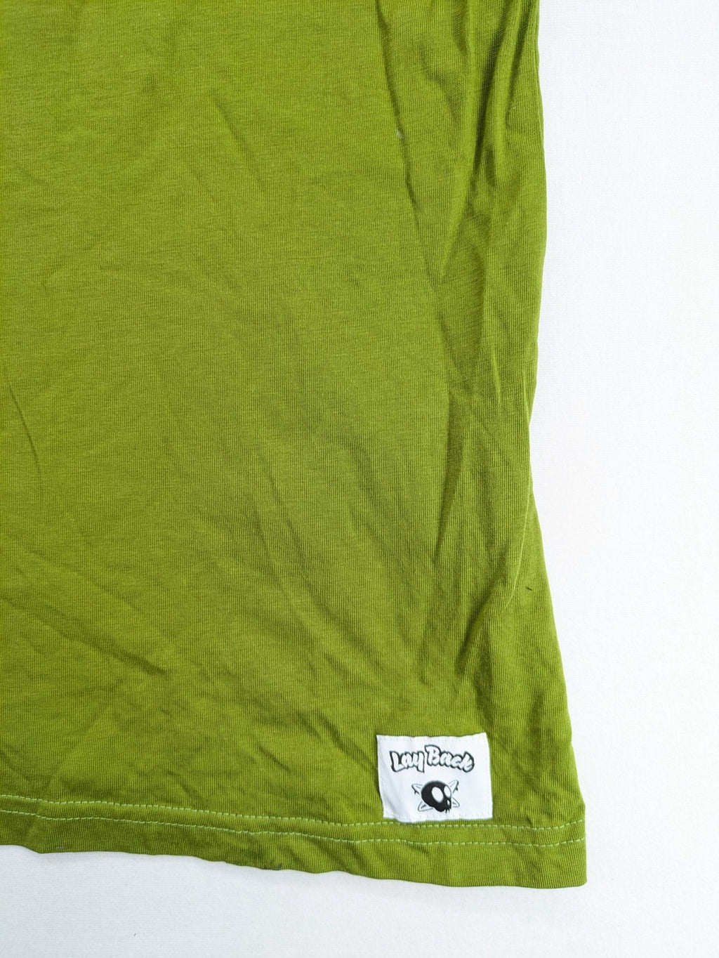 Lay Back green t-shirt with skull graphic, logo print, and short sleeves.