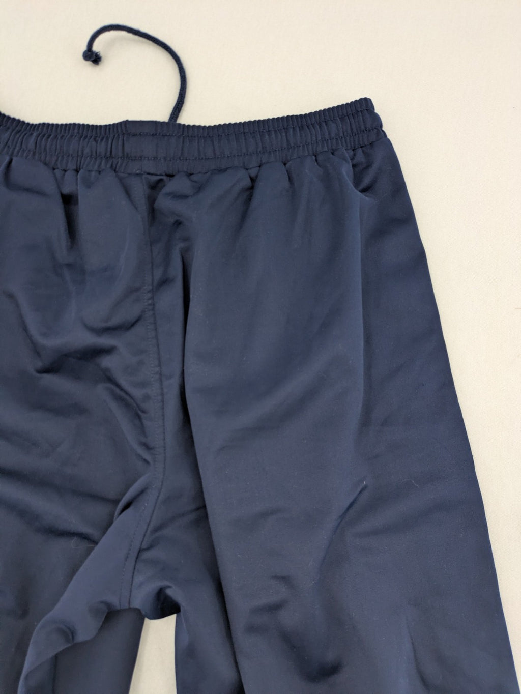 McORVIS blue tearaway training pants with side snap buttons and elastic waistband.