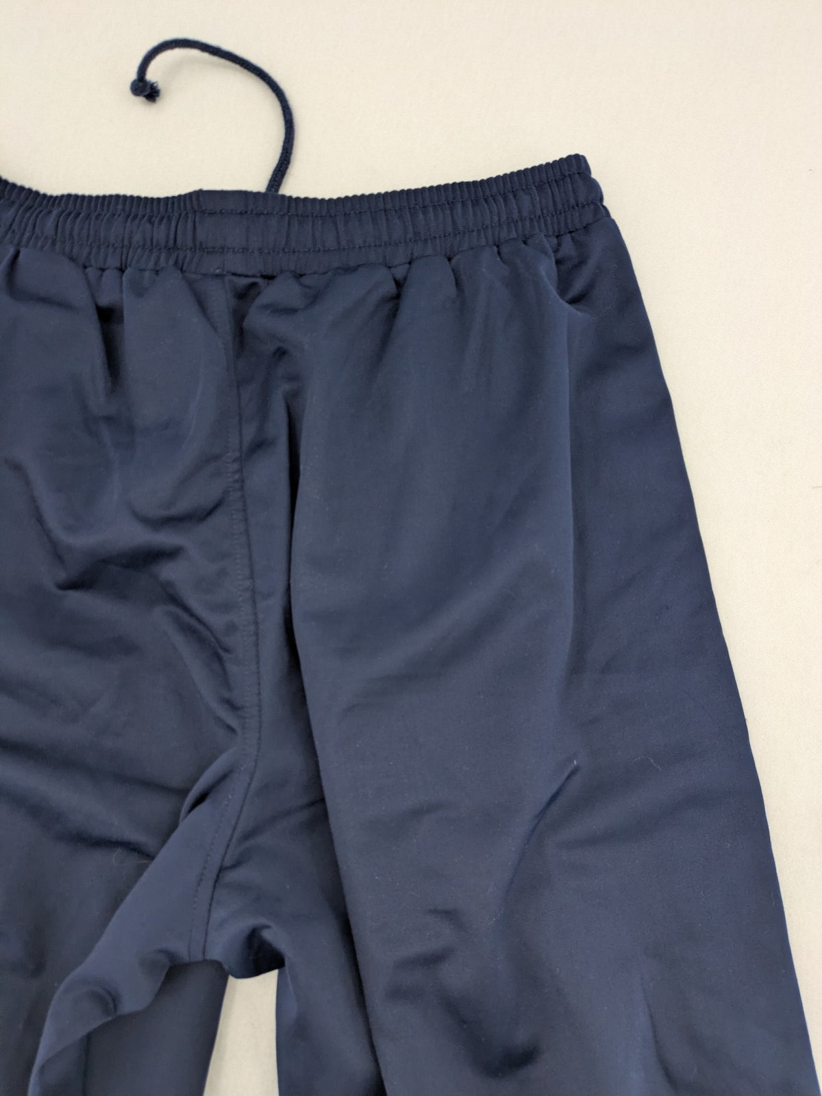 McORVIS blue tearaway training pants with side snap buttons and elastic waistband.