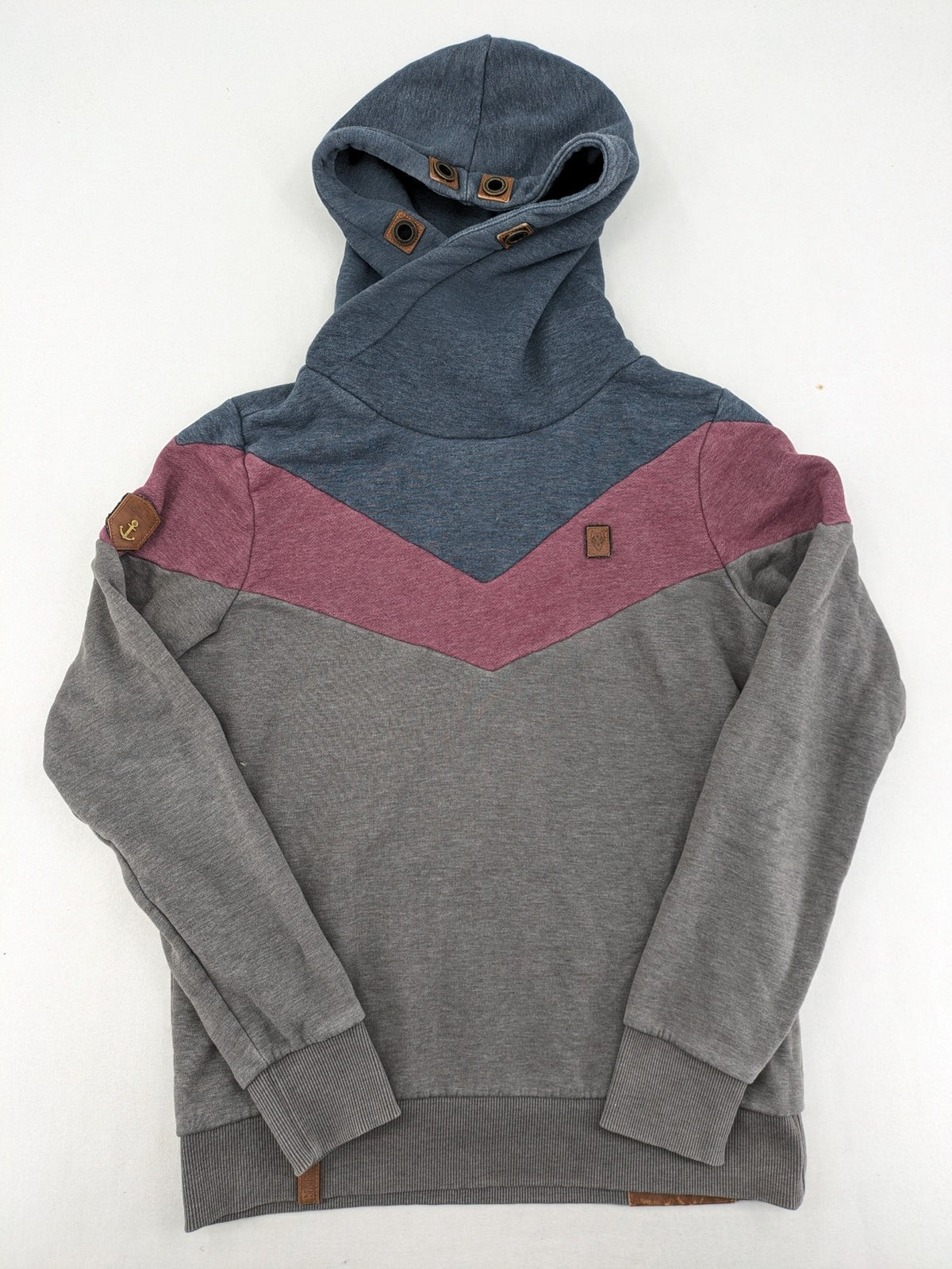 Naketano multicolor turtle neck jumper with button placket and anchor patches.