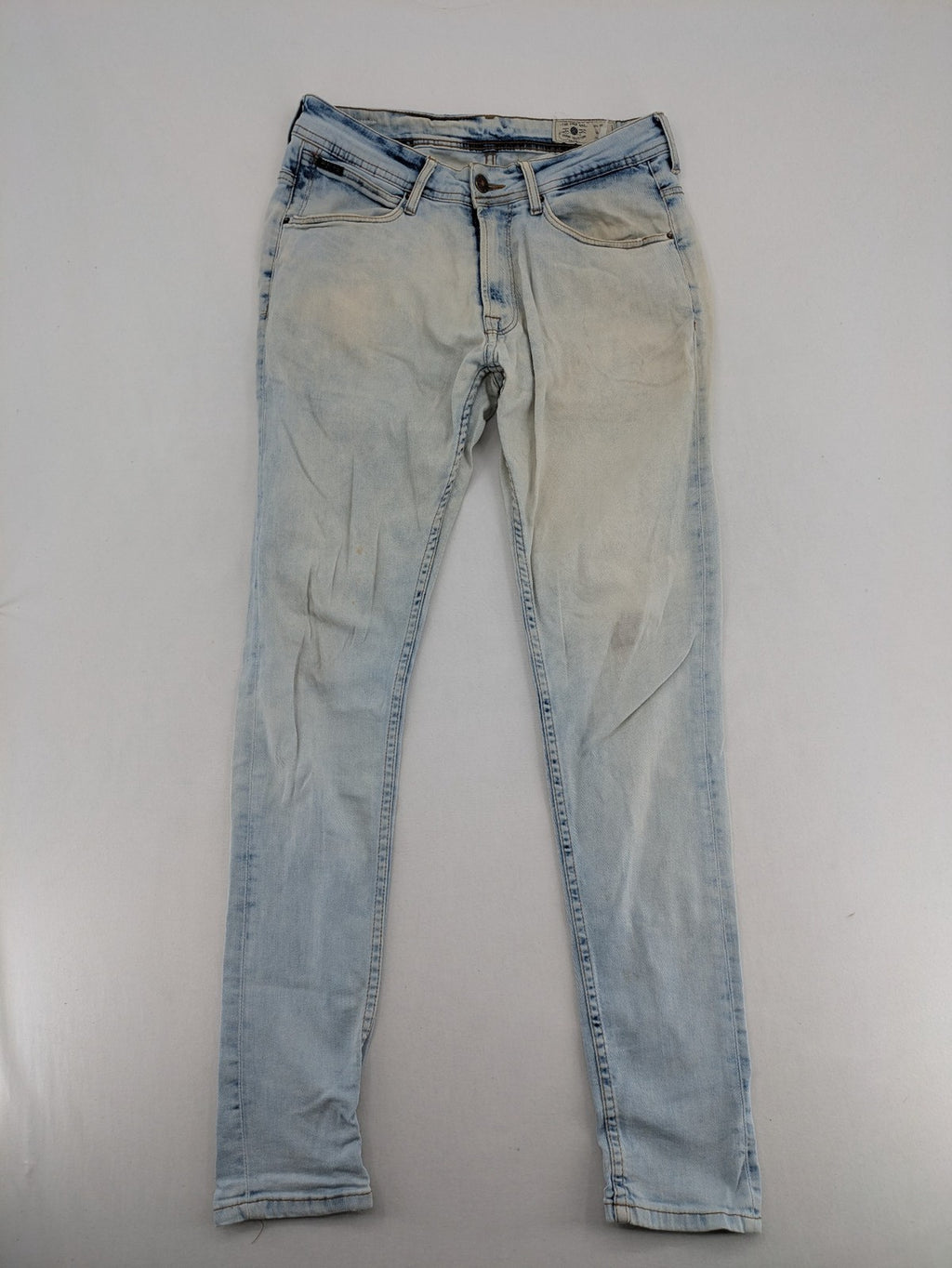 Zara Man blue skinny jeans with acid wash and classic five-pocket design.