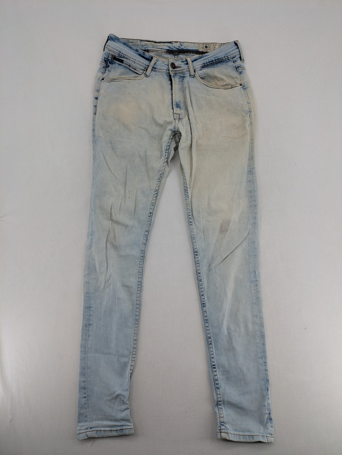 Zara Man blue skinny jeans with acid wash and classic five-pocket design.