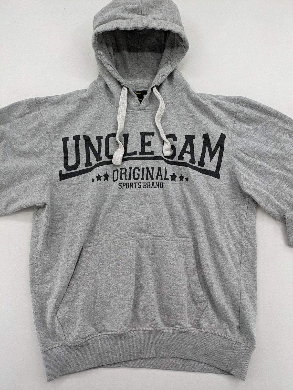 Uncle Sam grey hoodie with logo print, kangaroo pocket, and drawstring hood.