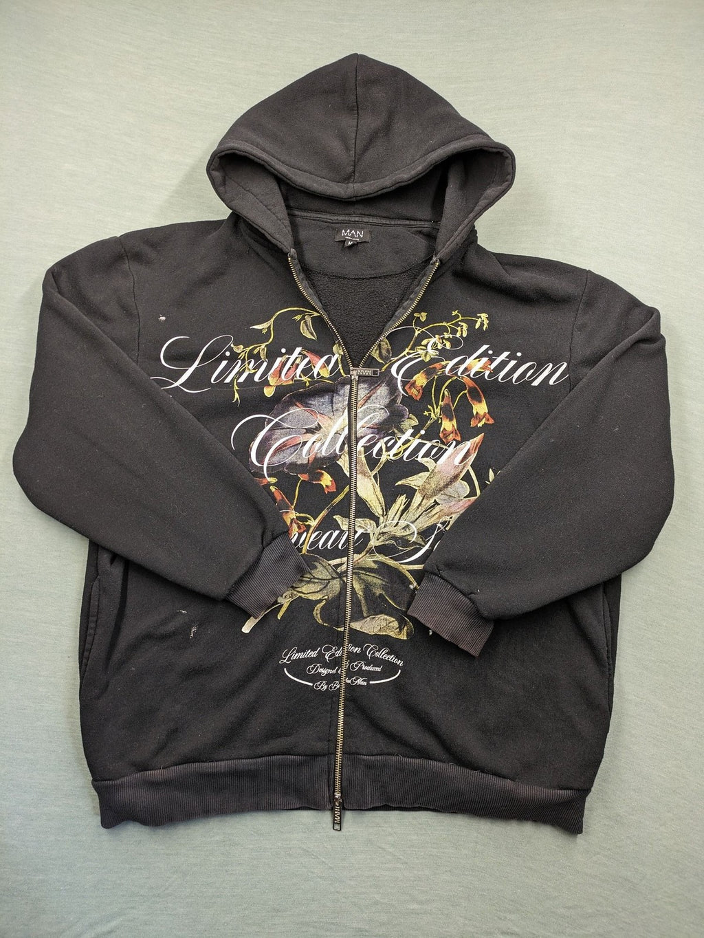 Boohooman zip-through hoodie black with floral graphic and "Limited Edition Collection" text.