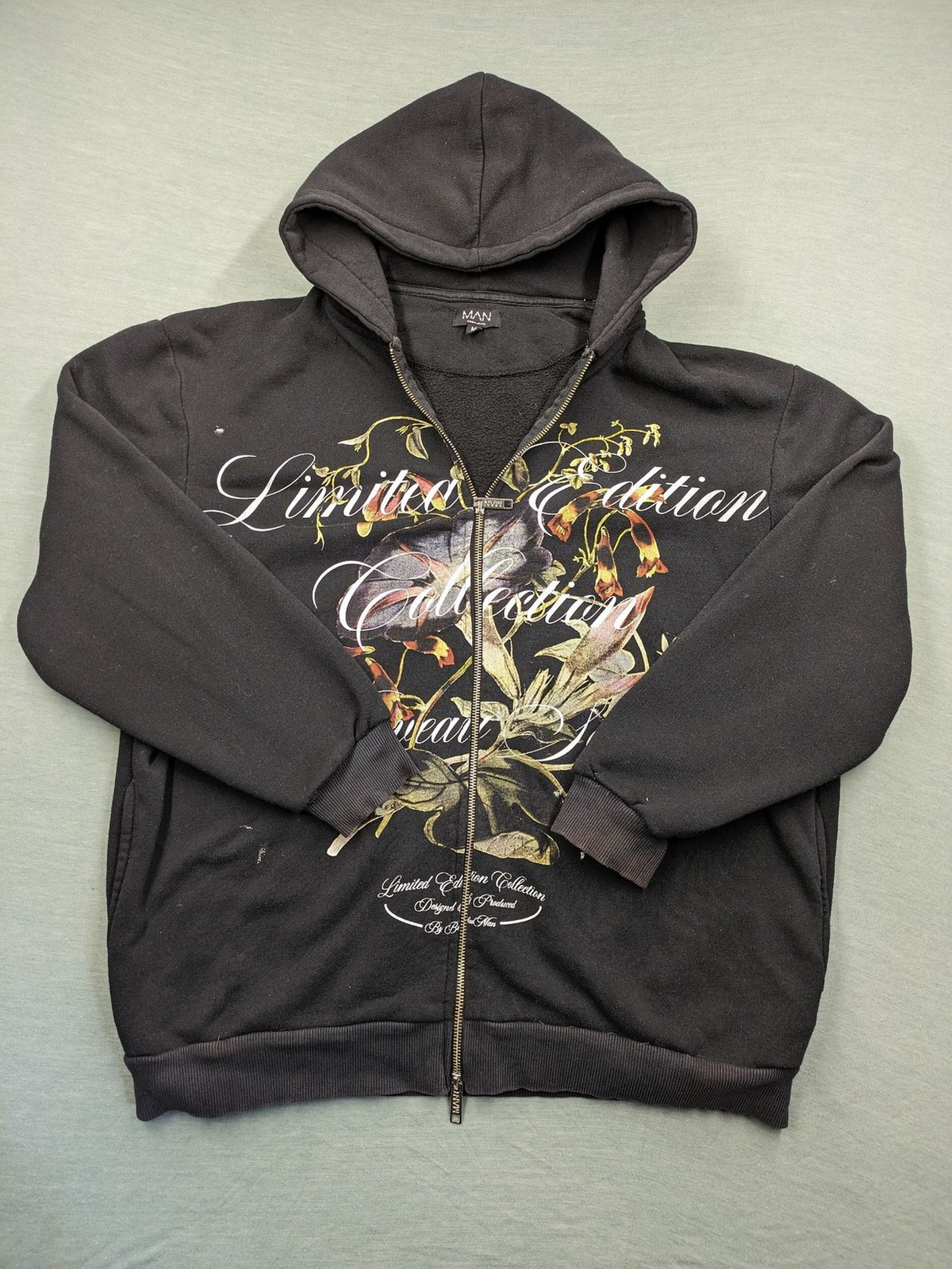 Boohooman zip-through hoodie black with floral graphic and "Limited Edition Collection" text.