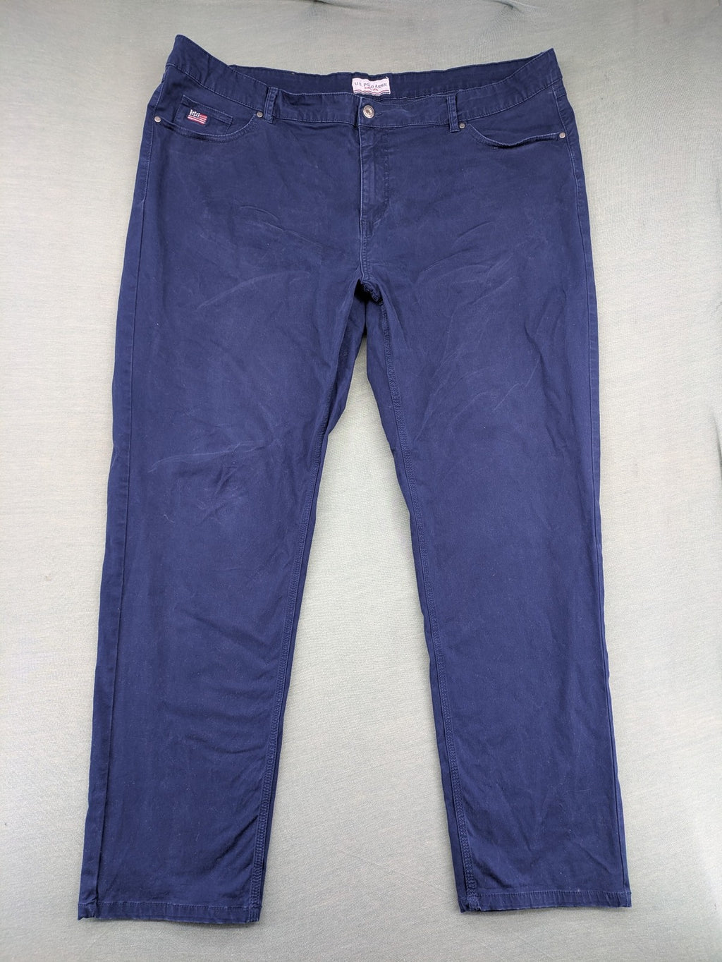 U.S. Polo Assn. navy chino pants classic 5-pocket design with subtle logo stitching