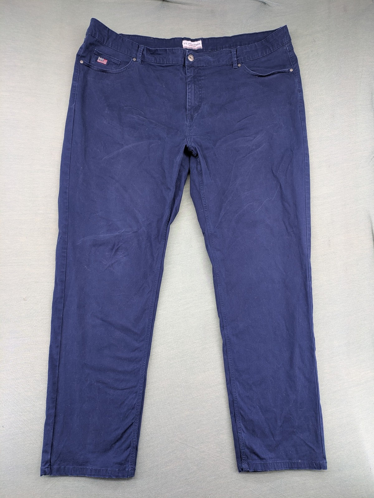 U.S. Polo Assn. navy chino pants classic 5-pocket design with subtle logo stitching