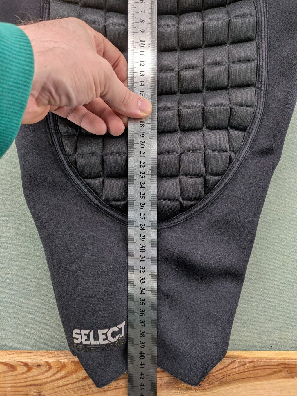 Select padded goalkeeper shorts black with robust hip and tailbone padding.
