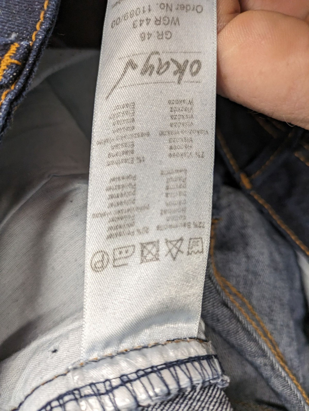 Okay blue straight jeans dark wash 5-pocket style with stretch material for comfort.
