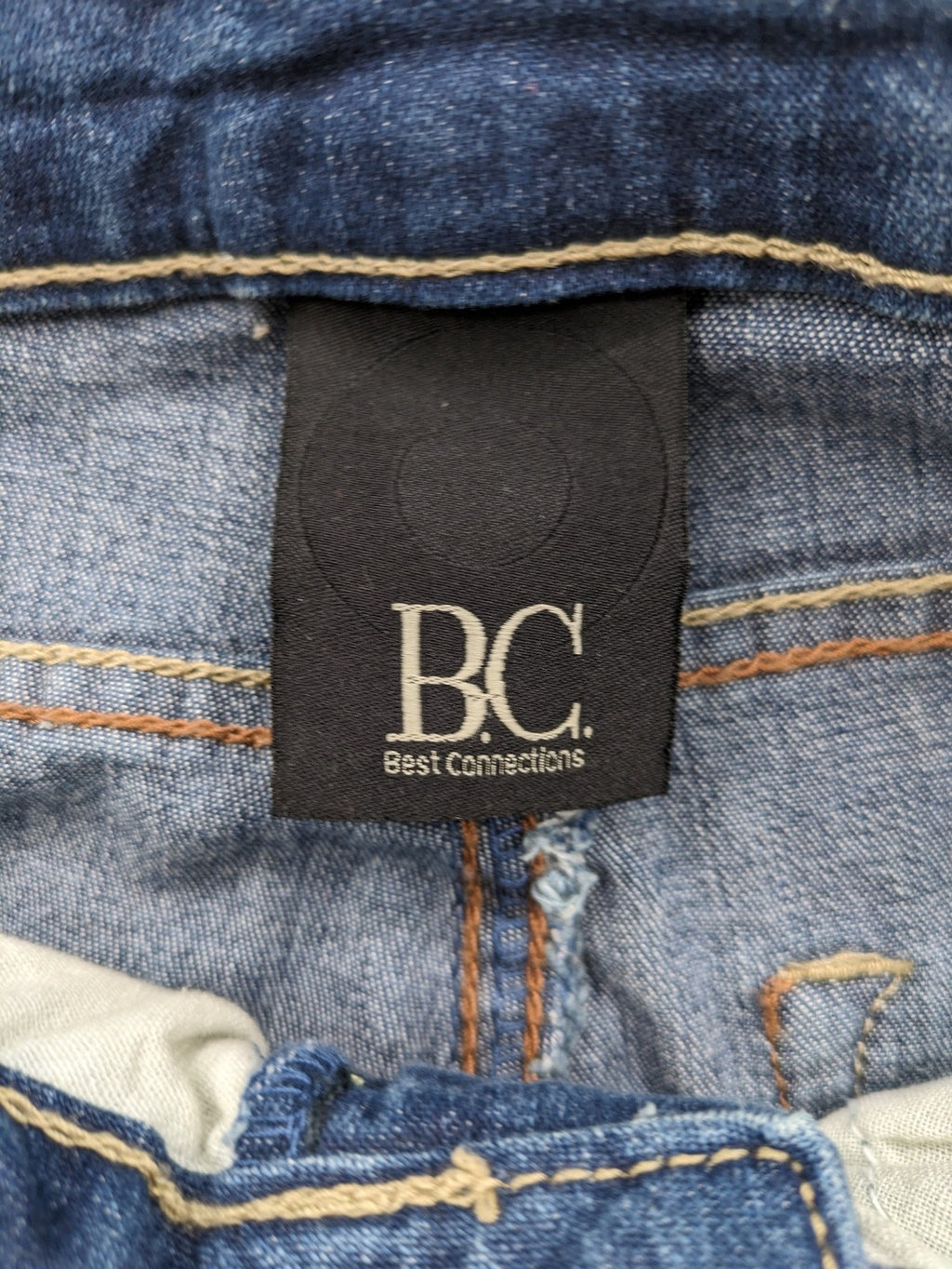 Best Connections blue skinny jeans with frayed hem and sporty side stripe.