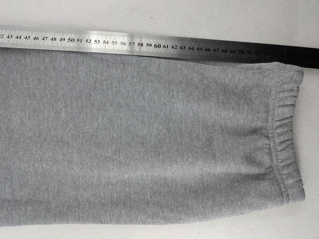 Skid Row grey joggers with red band logo, soft cotton blend, elastic waistband.