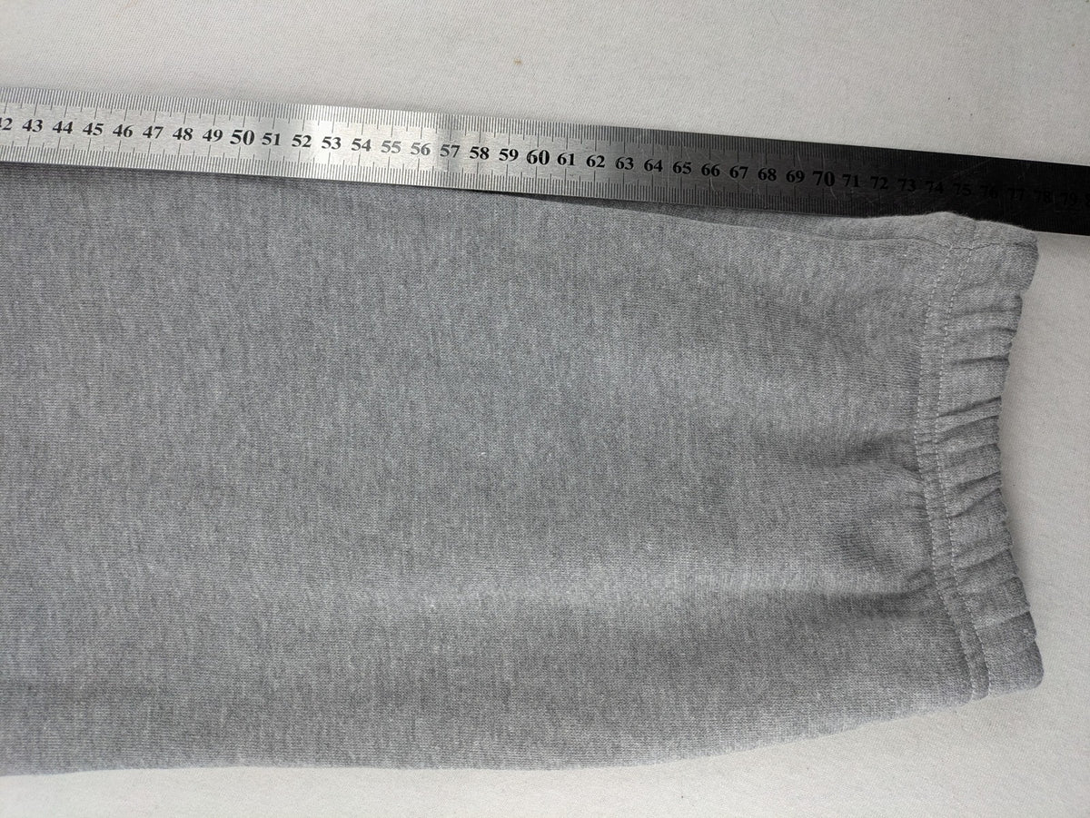 Skid Row grey joggers with red band logo, soft cotton blend, elastic waistband.