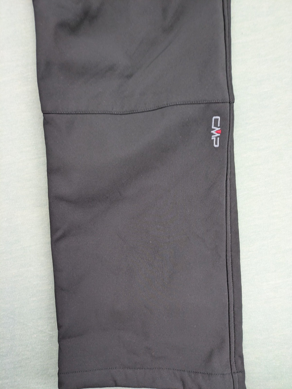 cmp black softshell pants with wind protection technology and white logo details