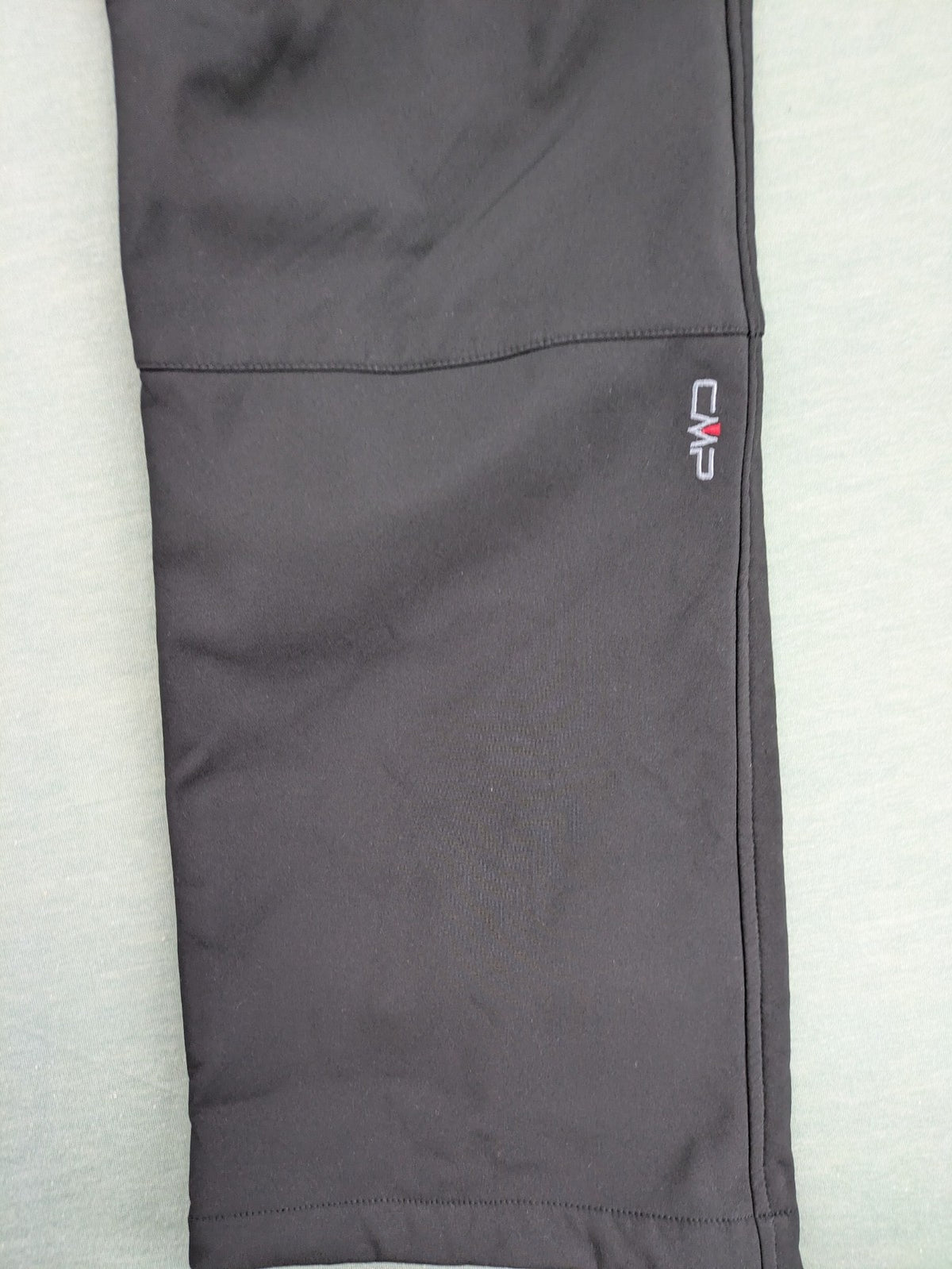 cmp black softshell pants with wind protection technology and white logo details