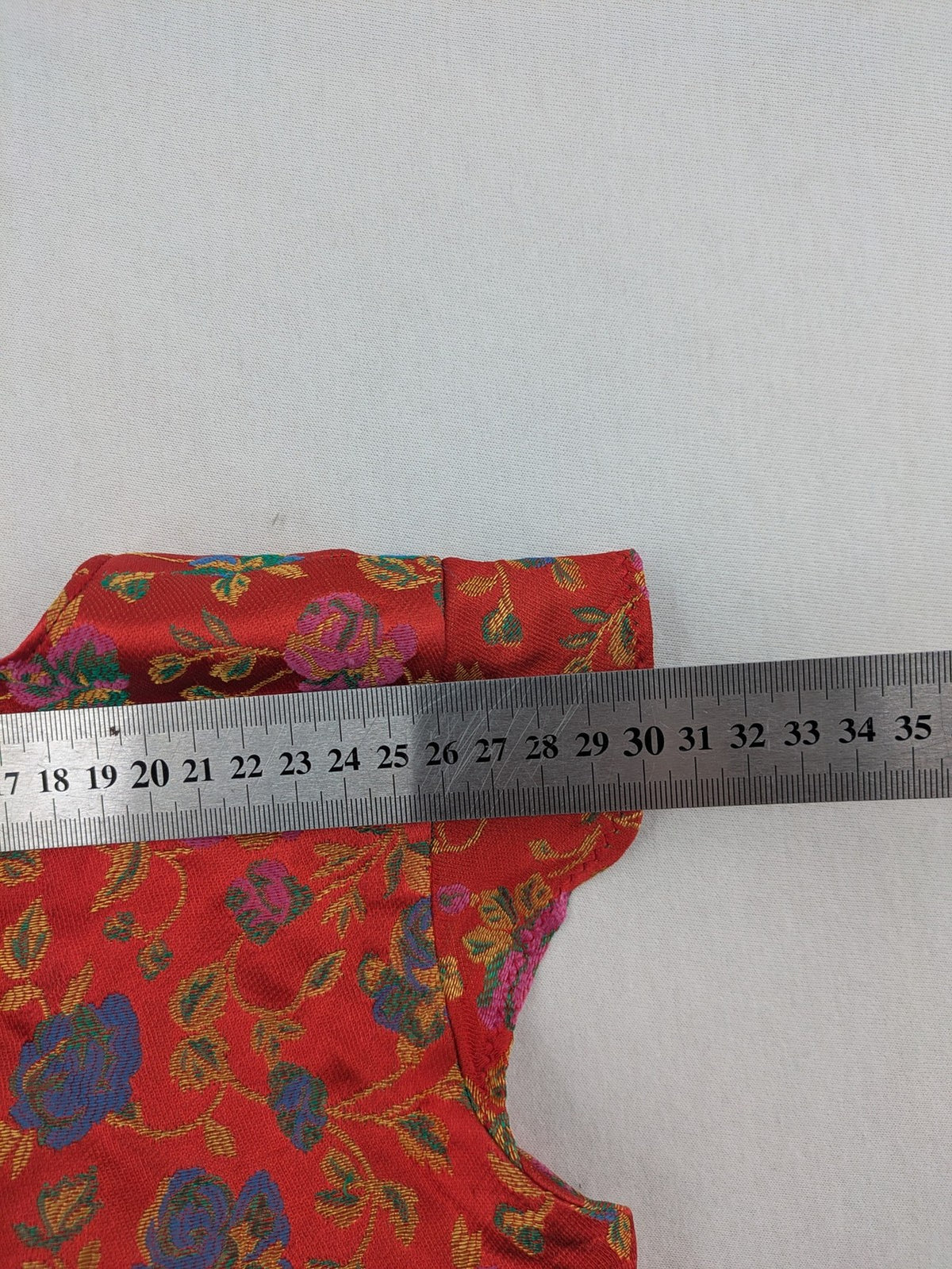 Jacquard multi A-line dress red floral jacquard pattern with matching waist tie.