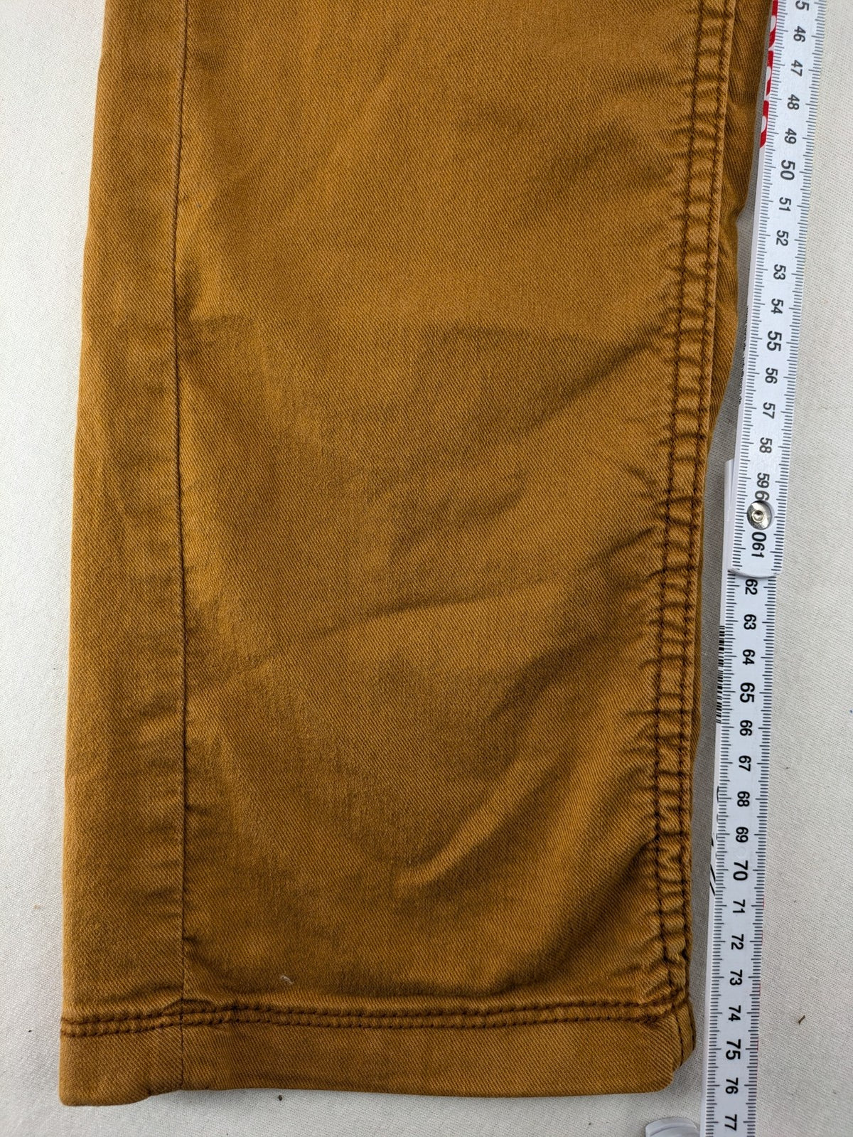 Bershka brown straight jeans slim fit classic 5-pocket design with prominent stitching.