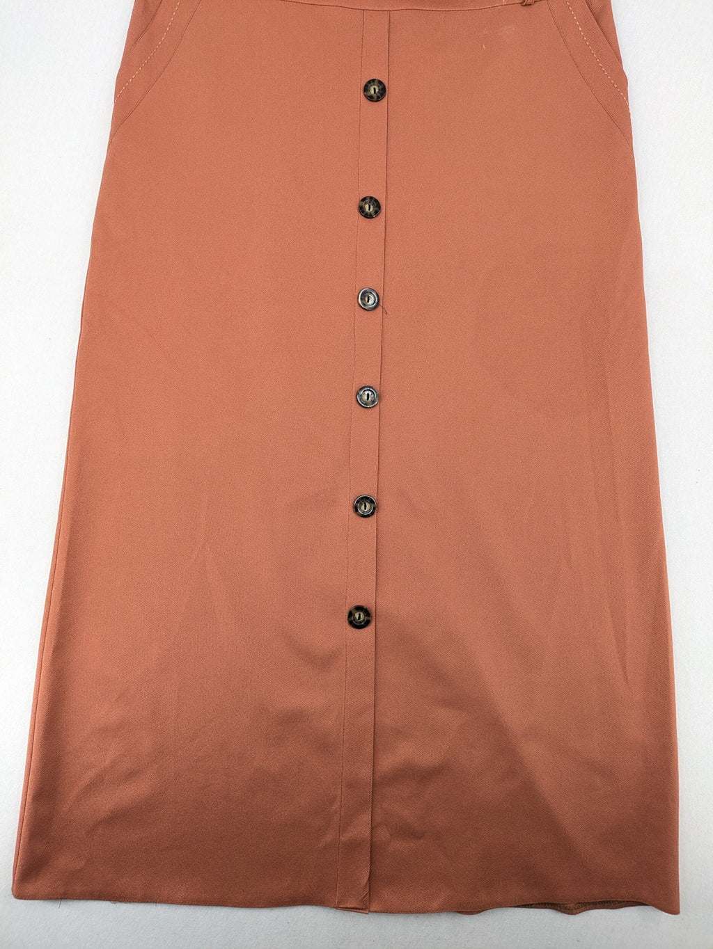 Moda orange long skirt A-line cut with front button placket and belt loops.