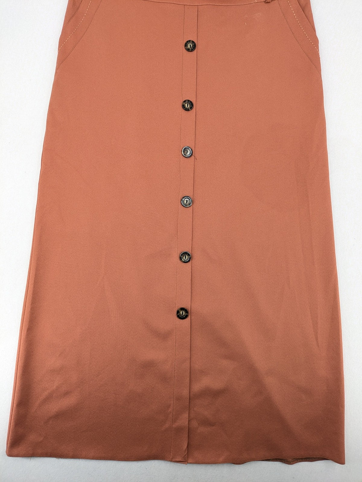 Moda orange long skirt A-line cut with front button placket and belt loops.