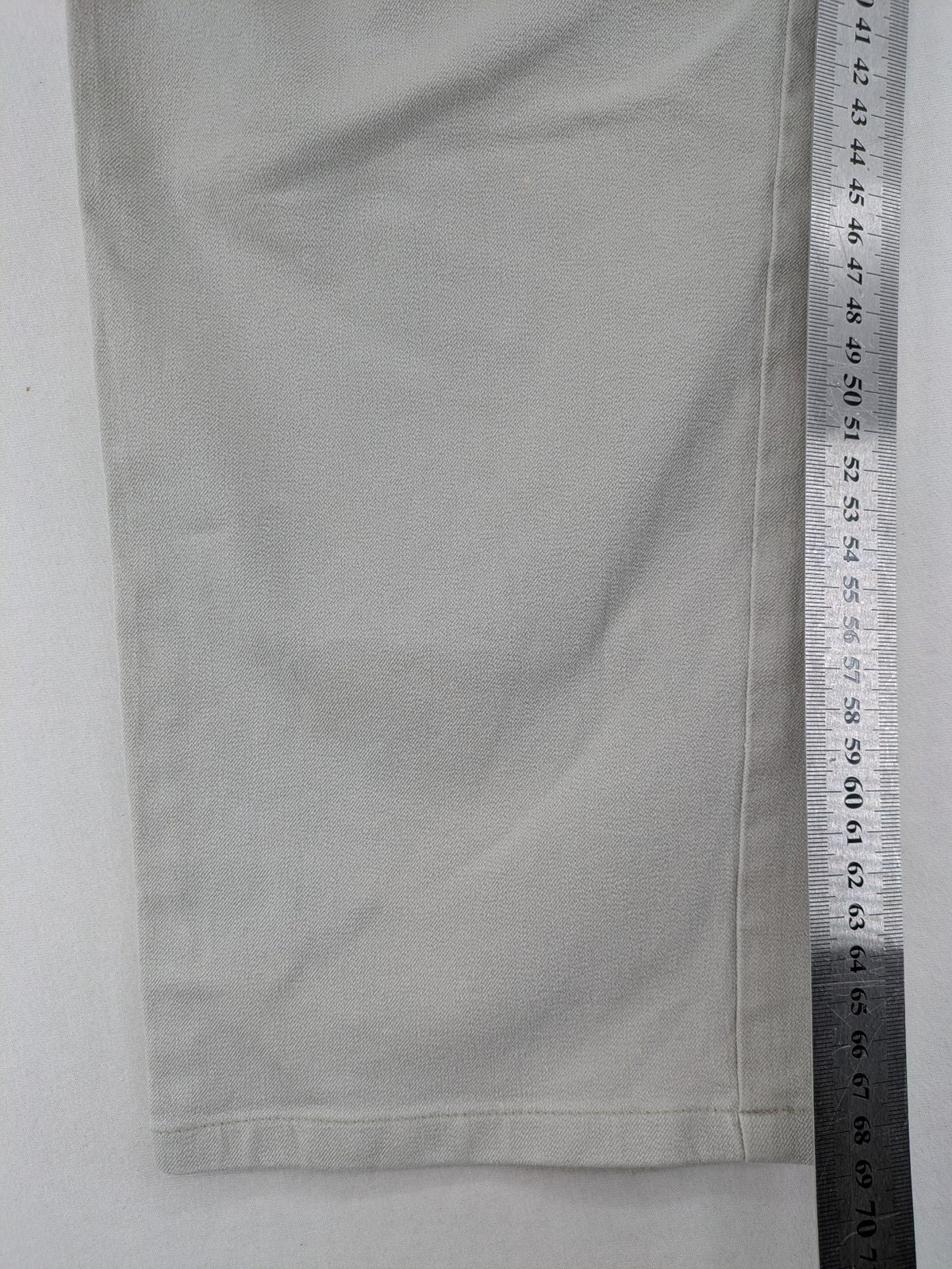 Vunic beige chinos with straight leg, 5-pocket design, and classic front zipper closure.
