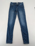H&M blue skinny jeans with distressed details and comfortable stretch denim material.