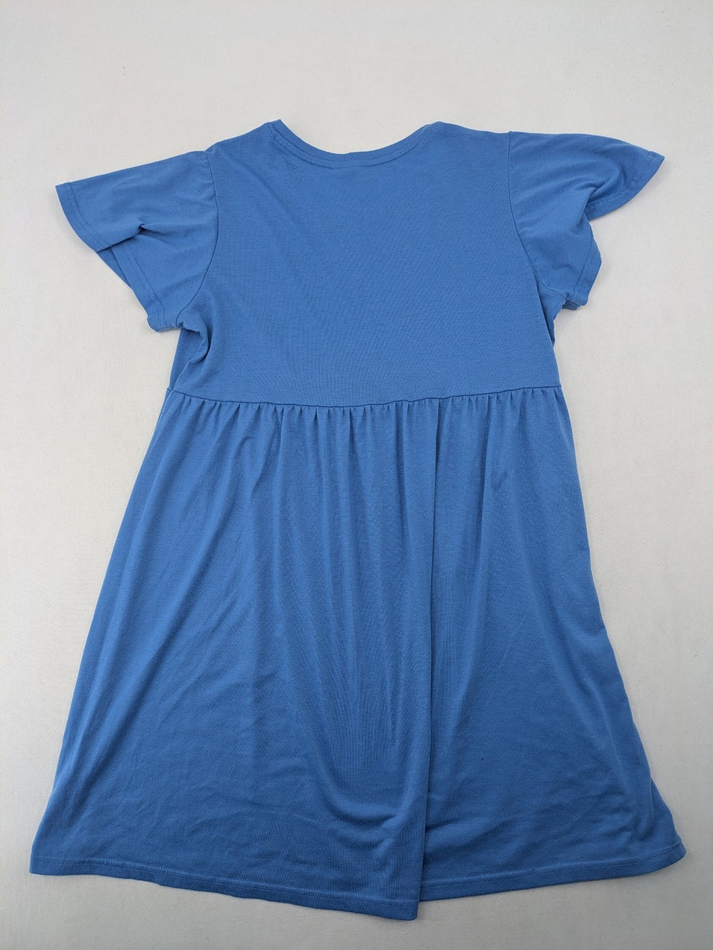 Infinity blue T-shirt dress A-line cut with playful flutter sleeves and soft stretch fabric.