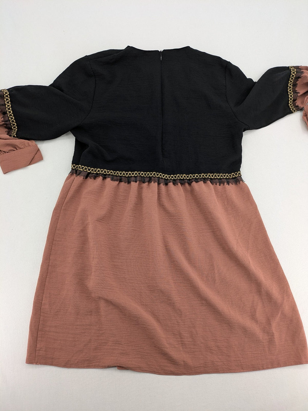 Efsun Moda grey and pink A-line dress with gold decorative chains and long balloon sleeves.