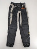 Pharao cream chaps with integrated knee protectors and adjustable waist belt.