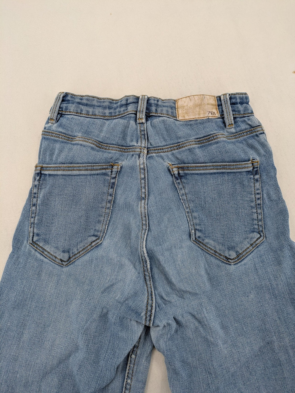 Zara blue high waist skinny jeans with classic wash and JOIN LIFE logo.