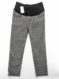 Damen grey maternity pants with black elastic belly band and stretch fabric.