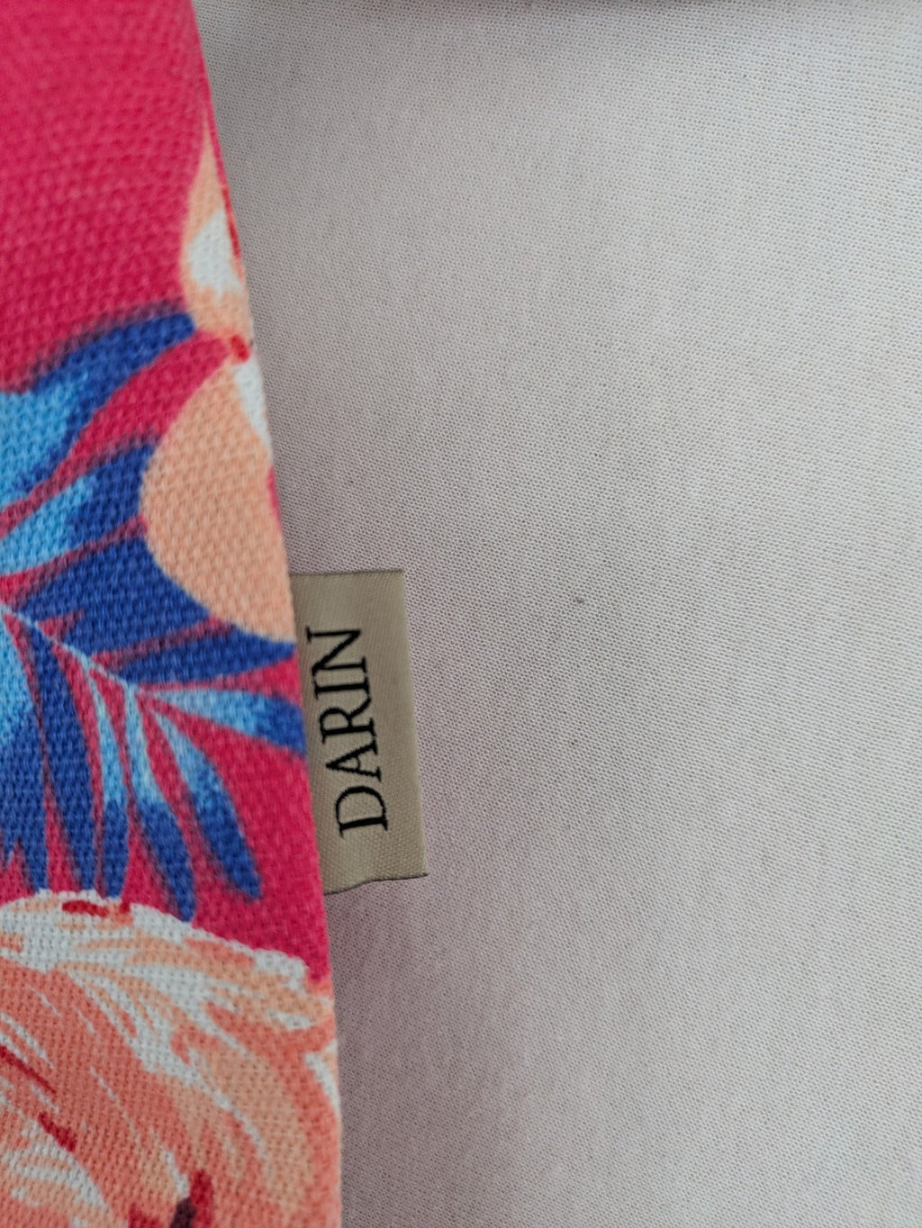 Flamingo pink shopping tote with vibrant tropical flamingo and palm leaf pattern.