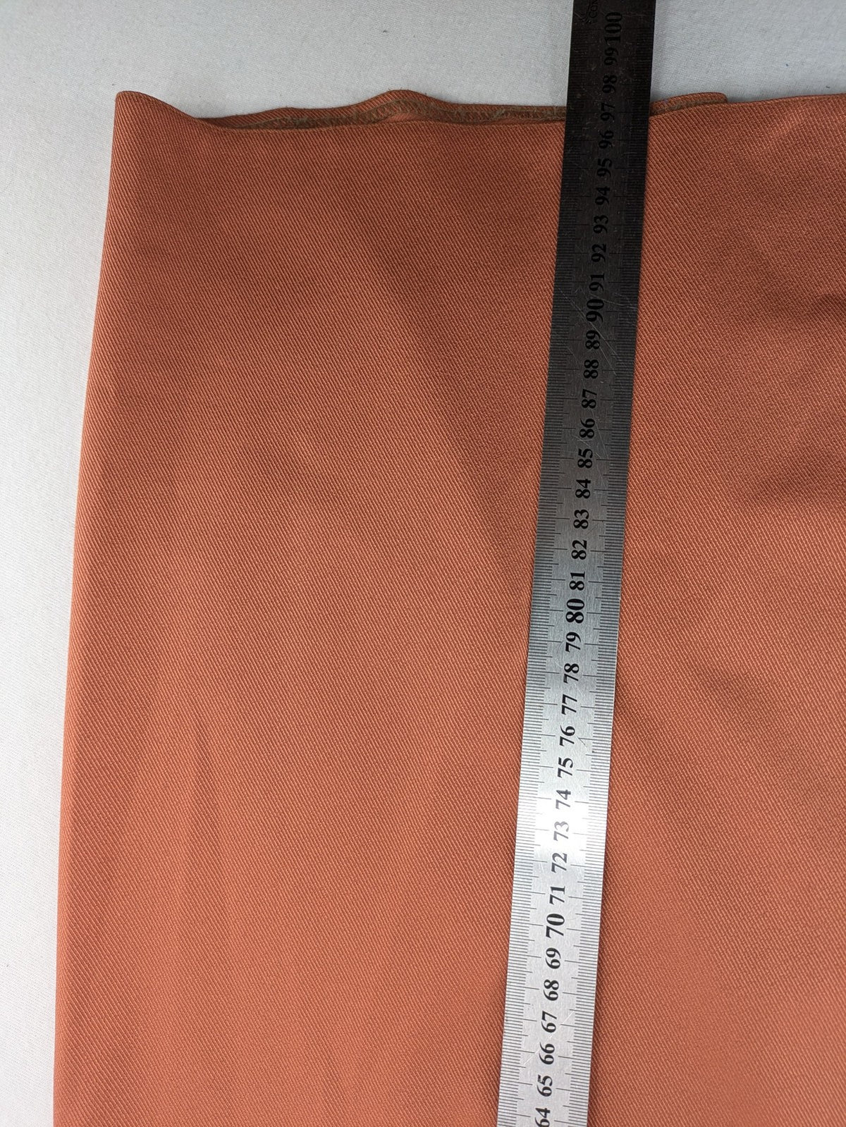 Moda orange long skirt A-line cut with front button placket and belt loops.