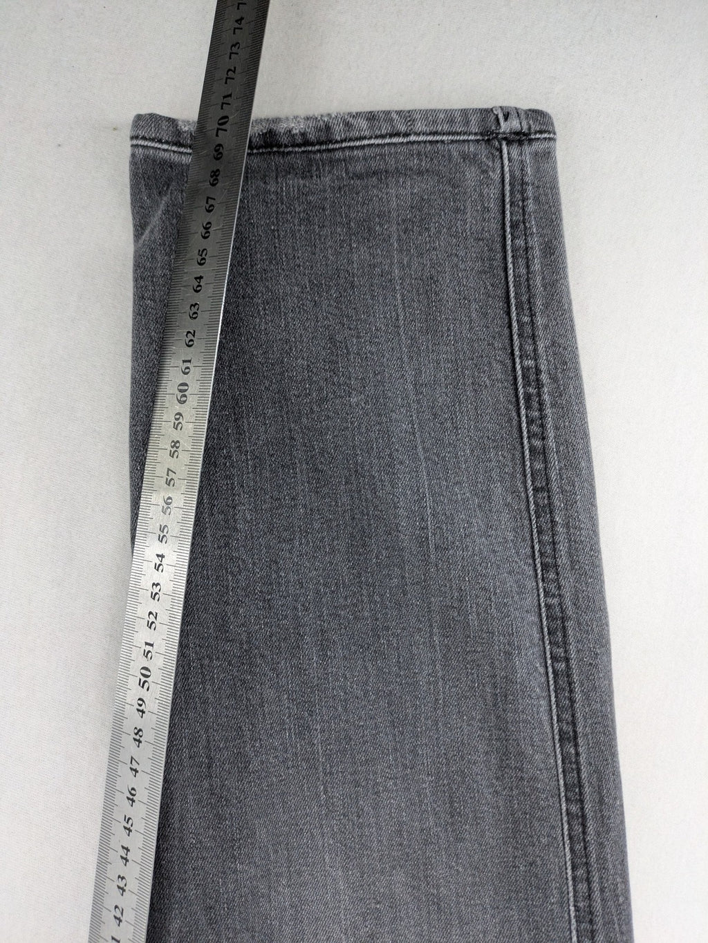 Replay grey straight jeans faded wash five-pocket style with logo on pocket.