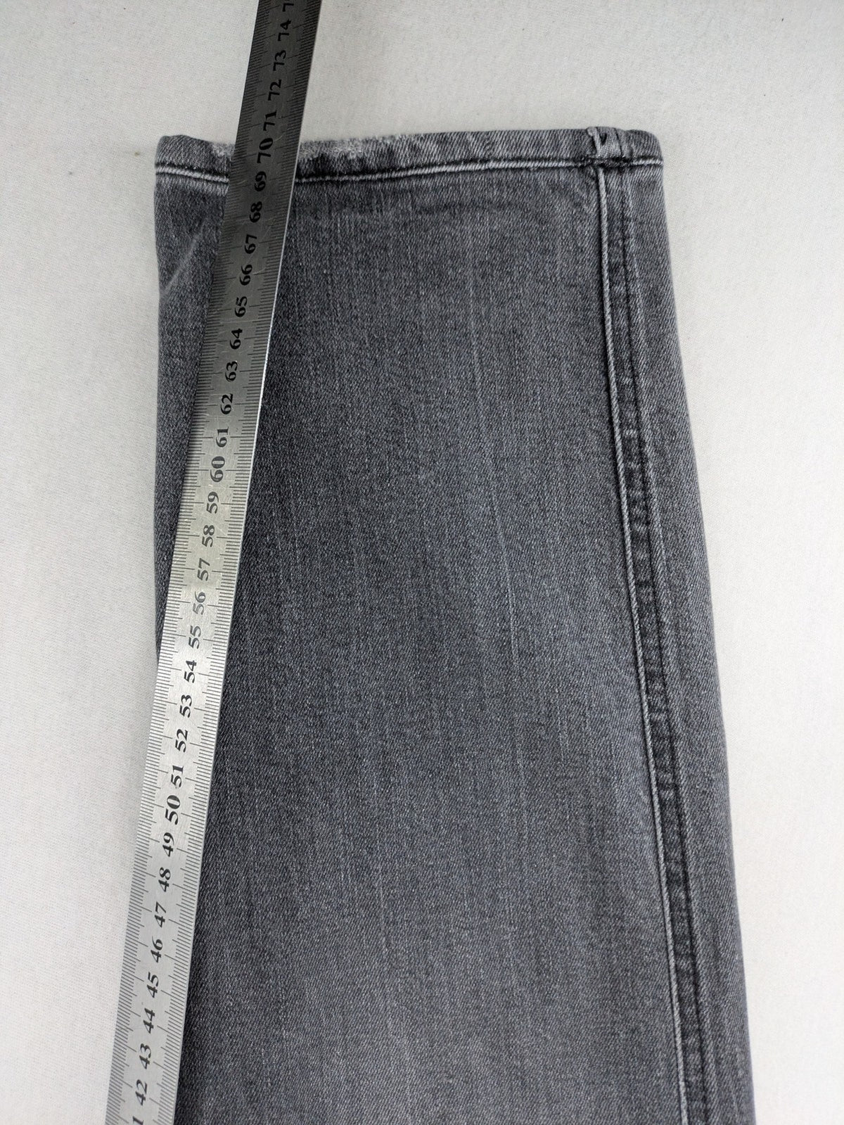 Replay grey straight jeans faded wash five-pocket style with logo on pocket.