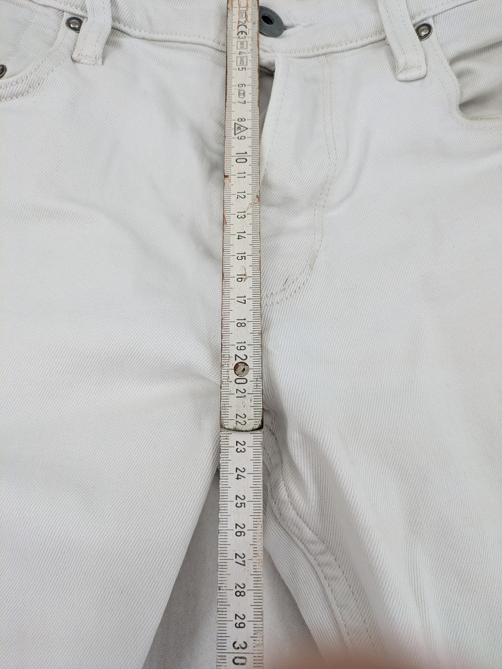 G-Star Raw white straight jeans with logo patch and stretch denim material.