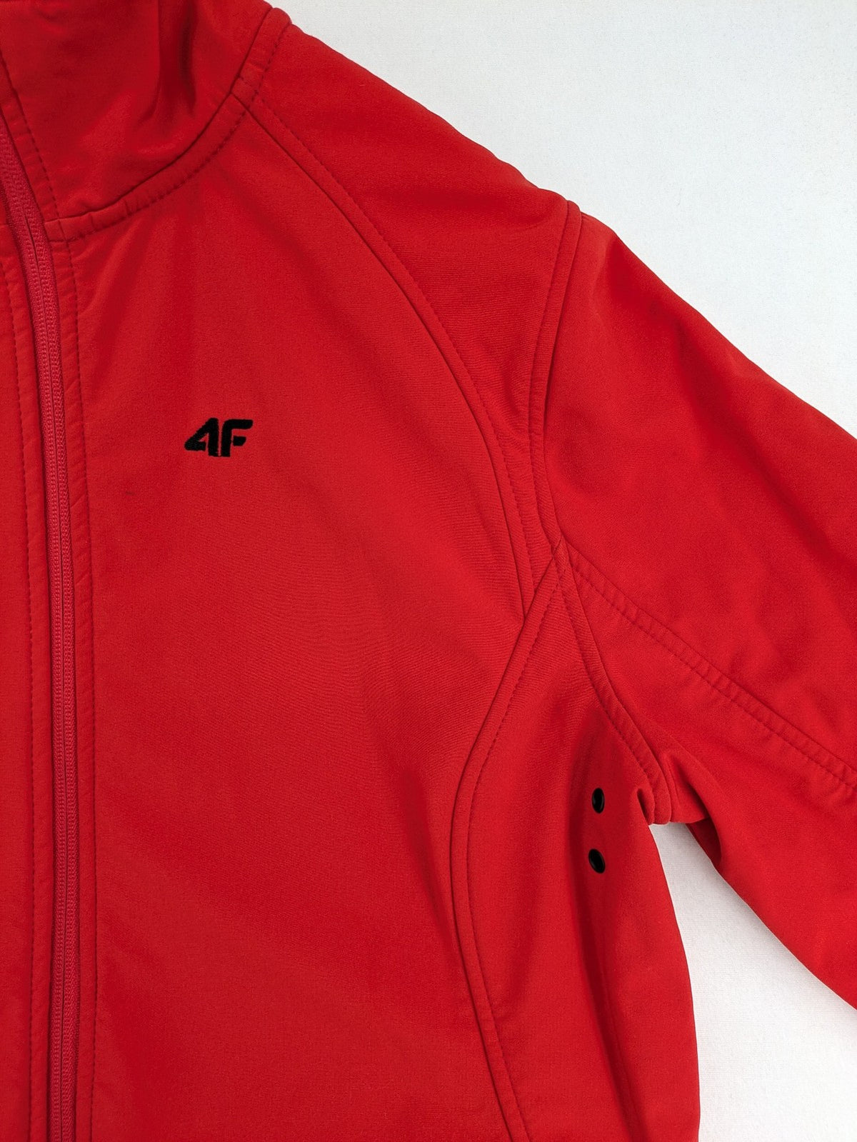 4F red softshell jacket with fleece lining and Aquatech 3000 logo detail.