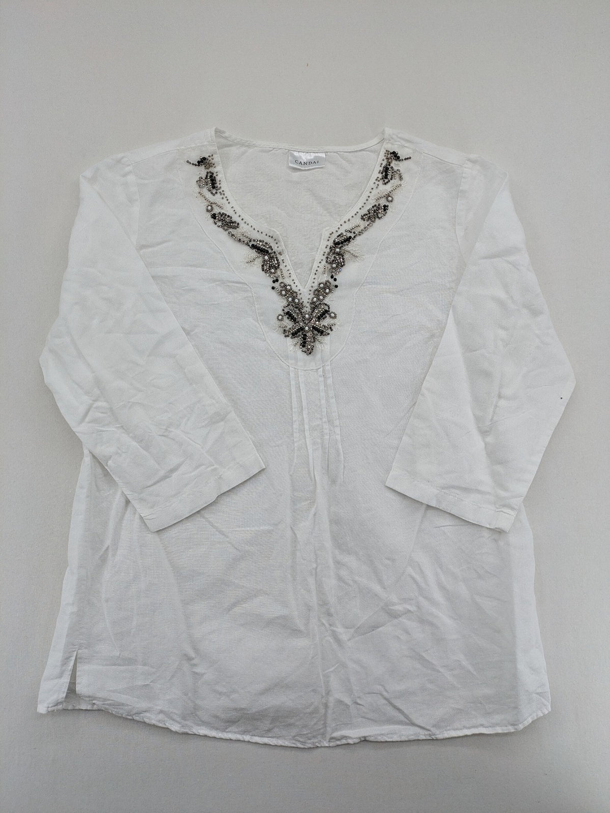 Canda white tunic top with embroidered V-neck, pearl and sequin details, 3/4 sleeves.