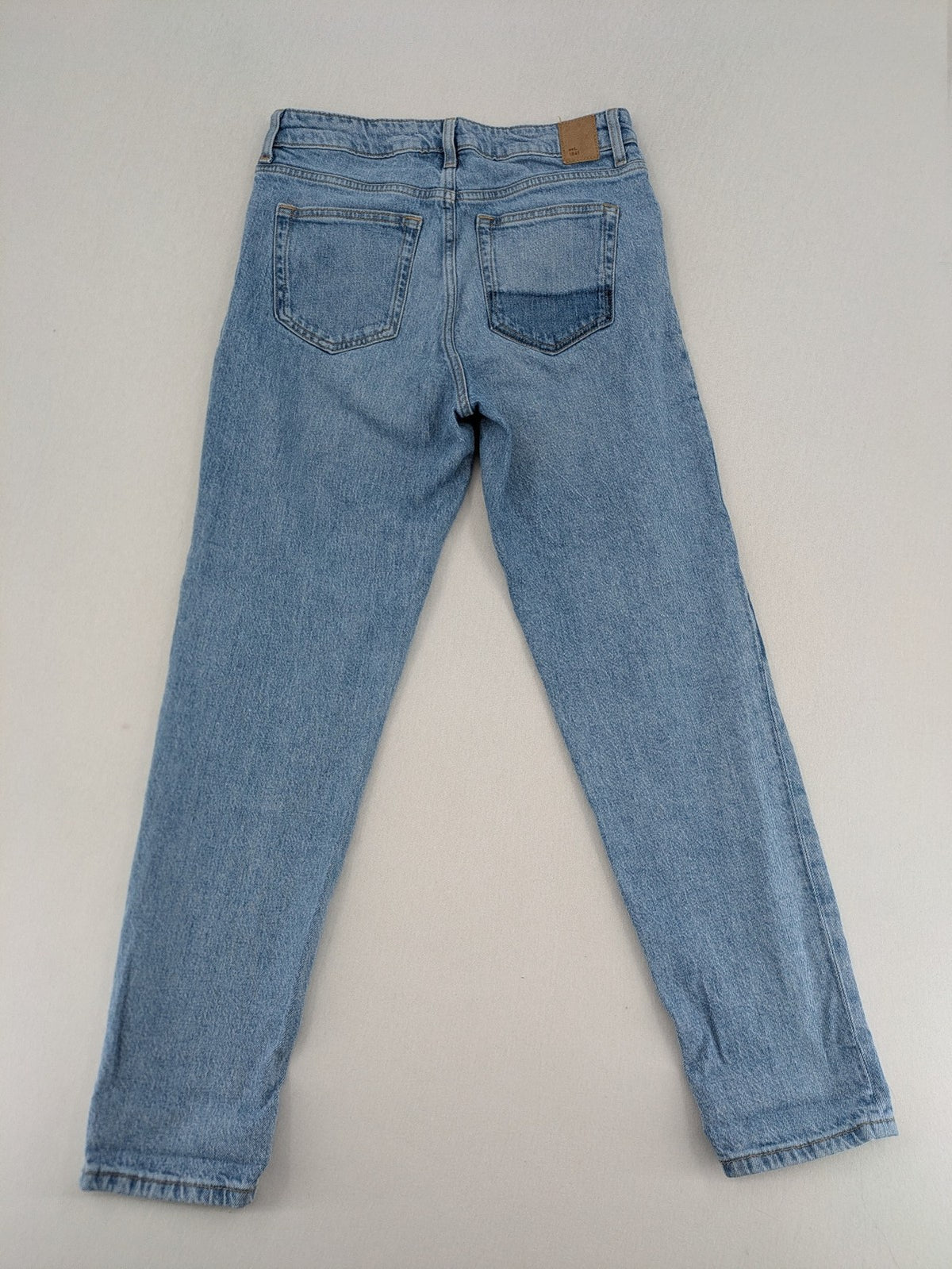 C&A blue mom jeans high waist with unique patchwork design and soft stretch denim.