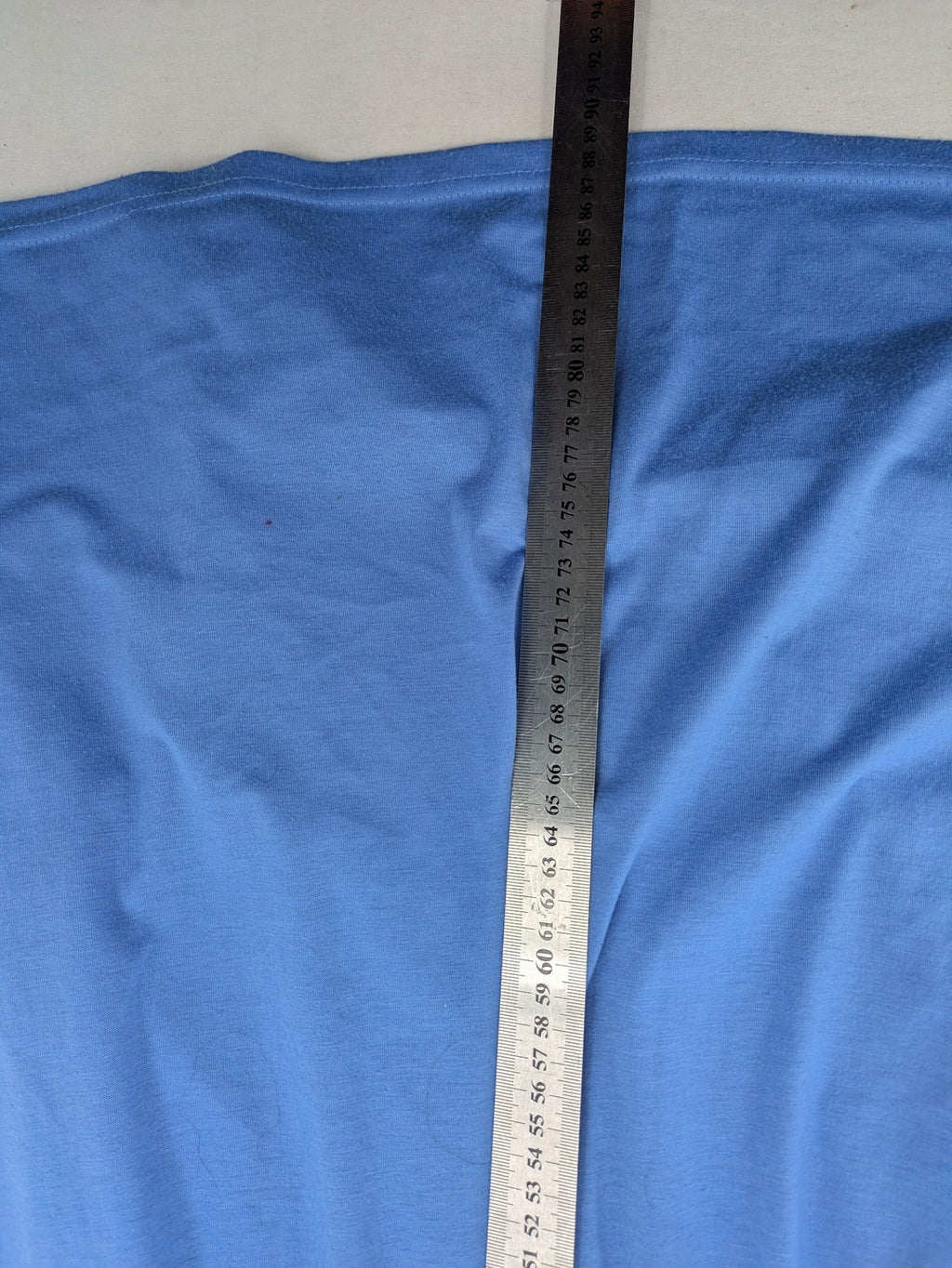 Infinity blue T-shirt dress A-line cut with playful flutter sleeves and soft stretch fabric.