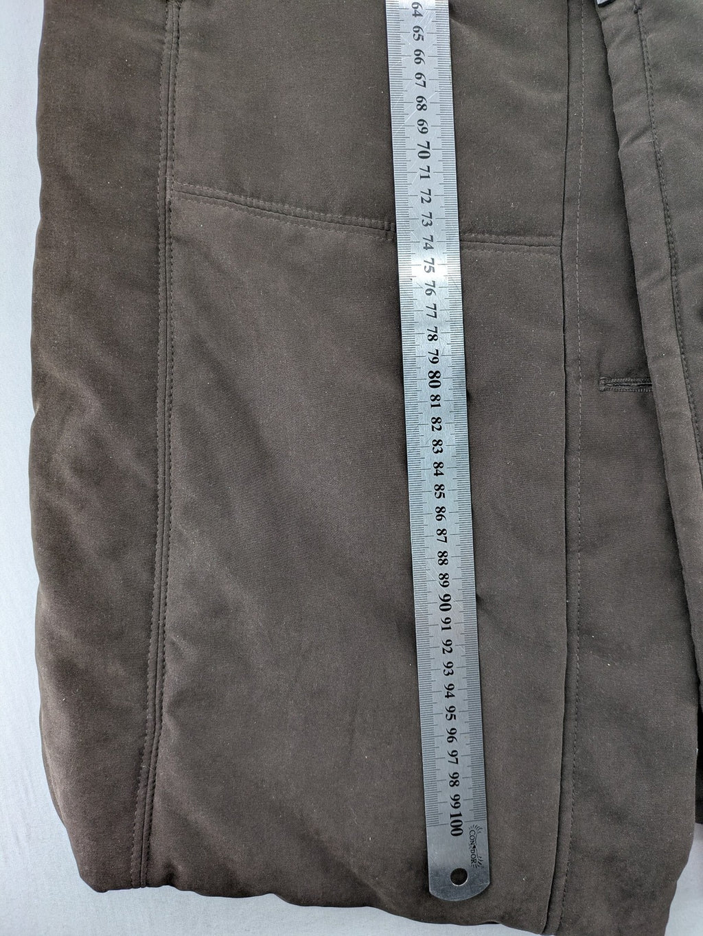 Goldix brown puffer coat size 46, button closure, padded design, classic style.